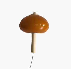 Mushroom-shaped lamp with a brown dome and white stem.