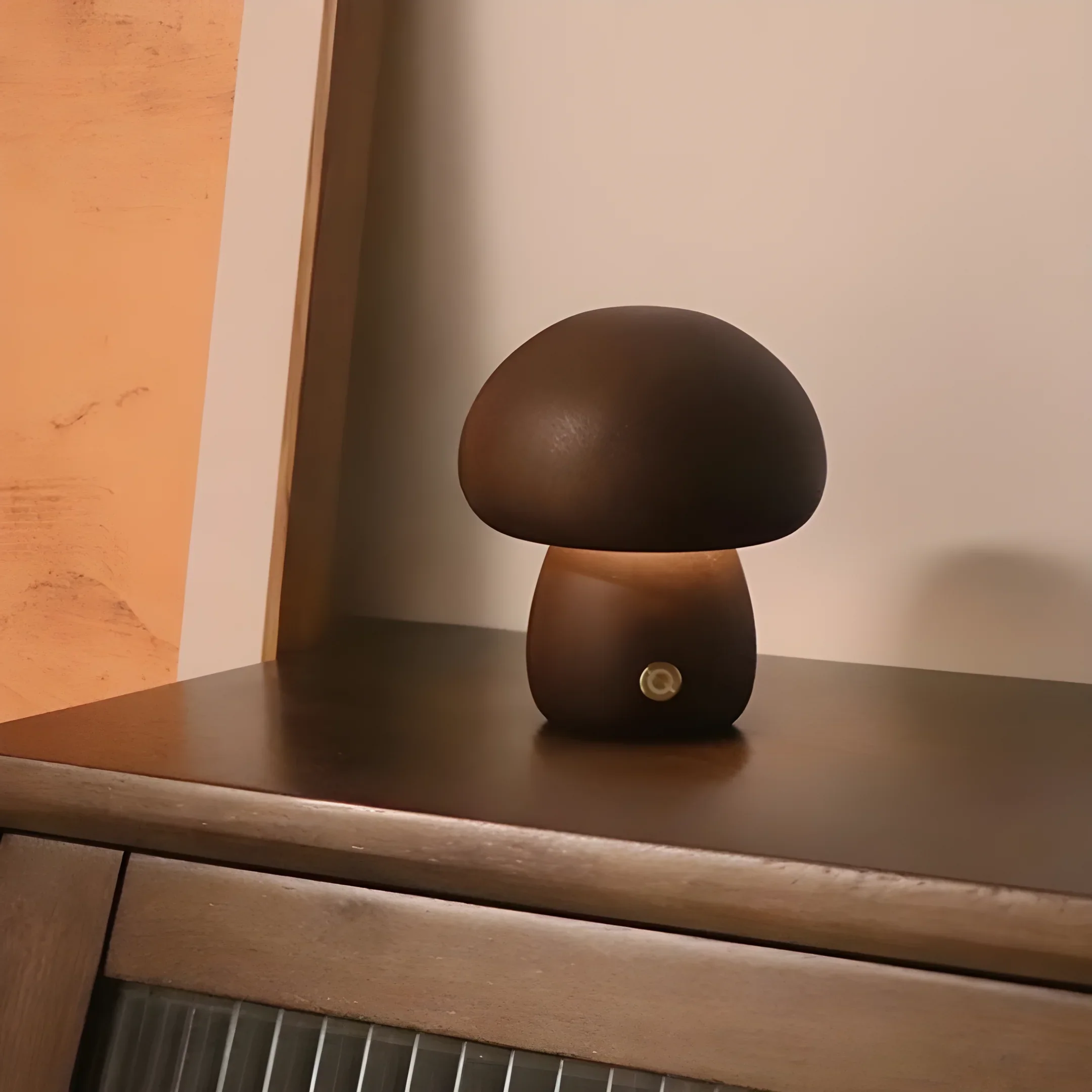 Mushroom-shaped brown lamp on a surface.