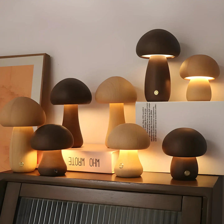 Collection of mushroom-shaped table lamps with glowing light.