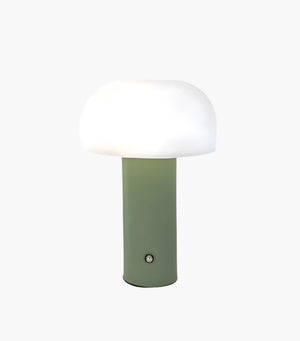 Mushroom-shaped table lamp with a green base and white dome shade.