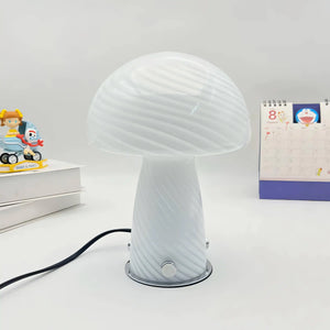 Mushroom-shaped table lamp with a frosted glass shade.