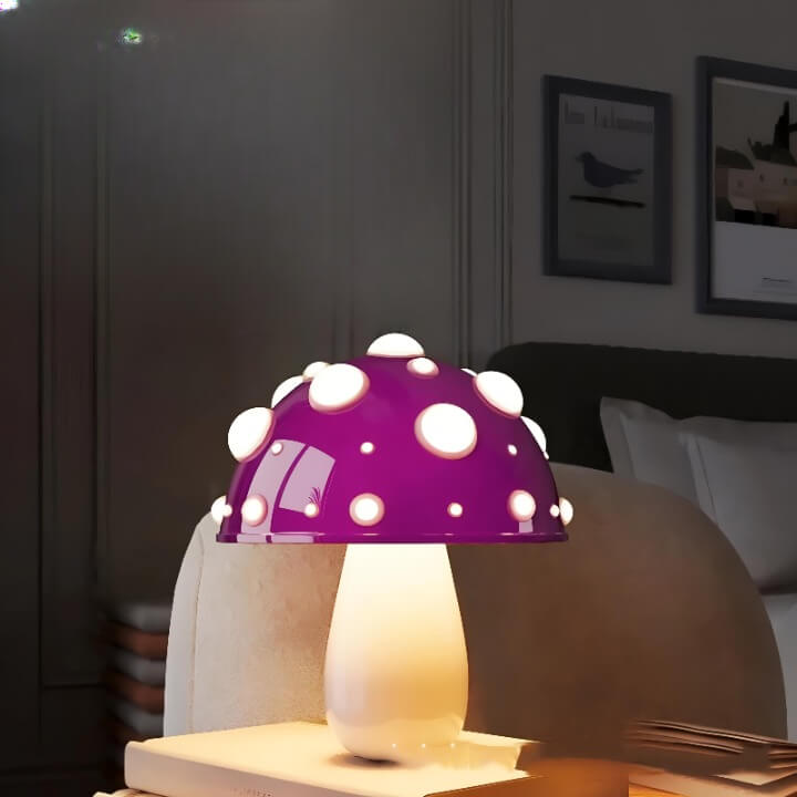 Whimsical purple mushroom-shaped lamp with white polka dots.