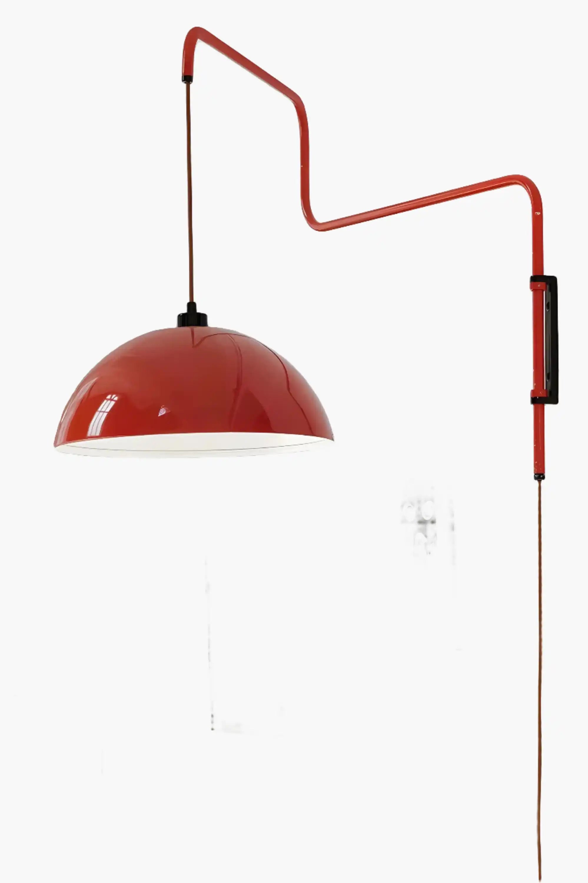 Red dome-shaped pendant lamp with an adjustable arm.